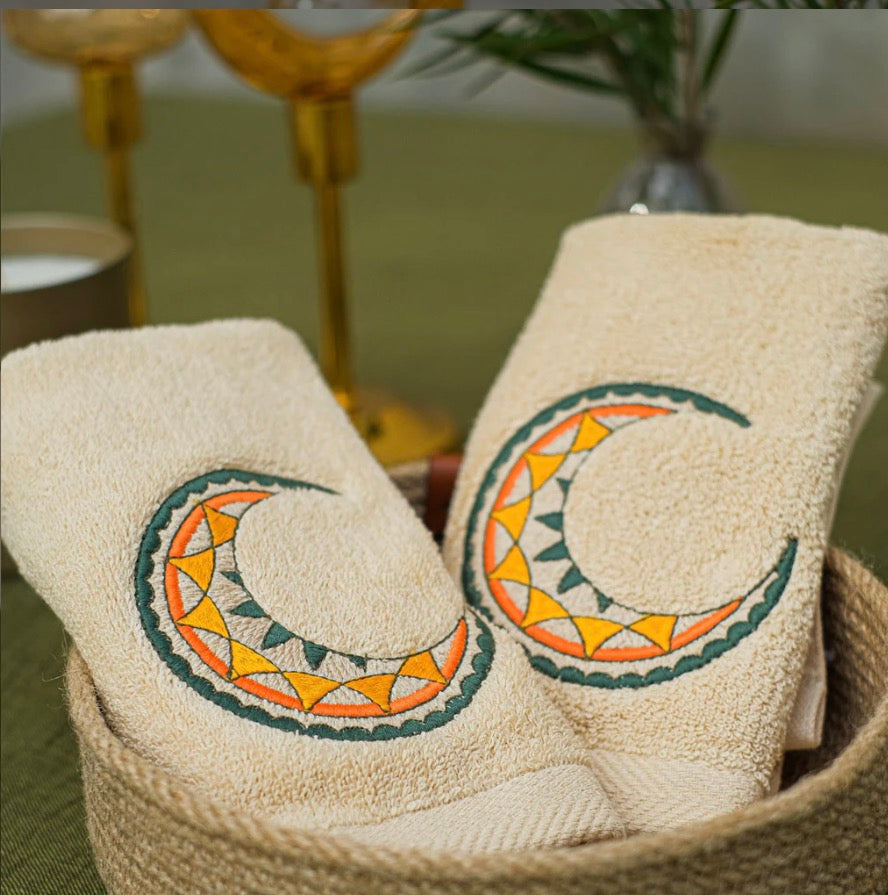 Radiant crescent guest towels